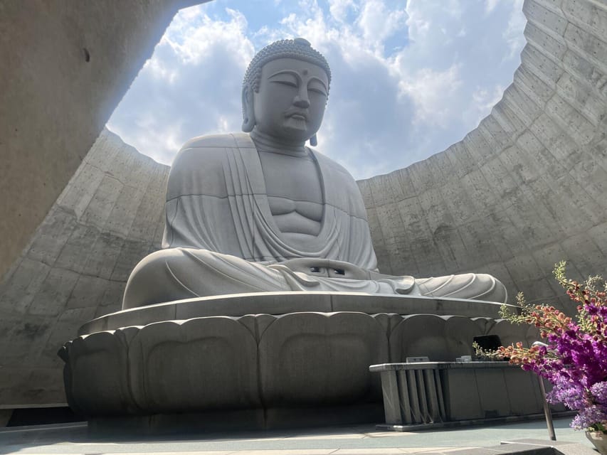 Sapporo: Buddha Hill, TV Tower, and Sake Stand Bar Tour - The Hill of the Buddha: arched tunnel to a 13.5-meter presence