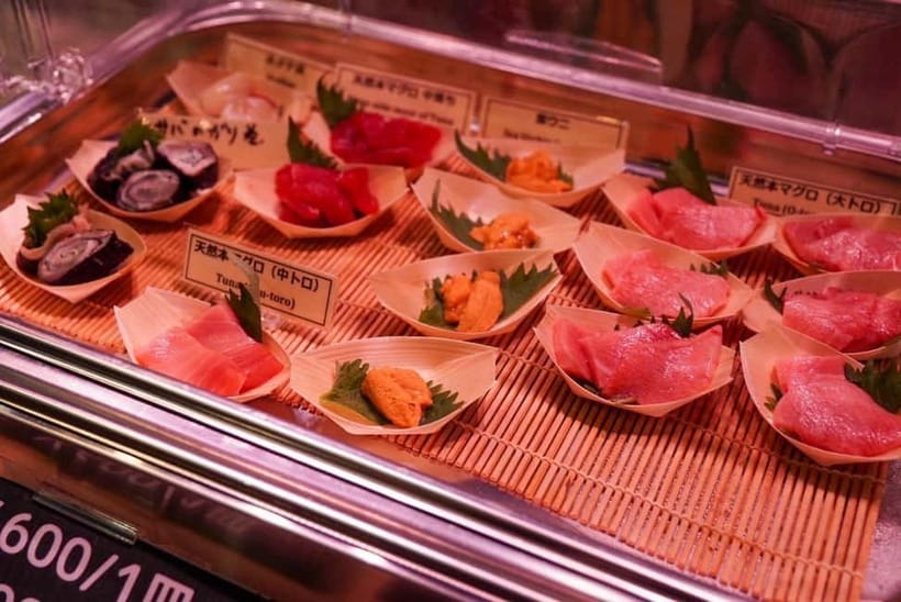 Tokyo: Private Tsukiji Street Food & Sake with Local Guide - First stop: Tsukiji Hongwanji and a temple that doesn’t match your expectations